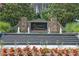 Governor's Preserve entrance with stone pillars, water features, and manicured landscaping at 122 Griffin Way, Canton, GA 30115