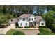 Charming two-story home with attached garage and lush landscaping at 122 Griffin Way, Canton, GA 30115