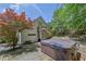 Backyard deck featuring a hot tub with trees at 122 Griffin Way, Canton, GA 30115