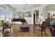 Elegant living room with wood floors, piano, and ample seating area at 122 Griffin Way, Canton, GA 30115