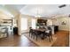 Open-concept dining room and kitchen area featuring hardwood floors and ample natural light at 166 Martha Ave, Atlanta, GA 30317