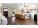 Spacious living room featuring a vaulted ceiling, hardwood floors and stylish furniture at 166 Martha Ave, Atlanta, GA 30317