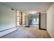 View of the basement area featuring a carpeted floor and bi-fold doors to additional rooms at 191 White Oak Church Rd, Dallas, GA 30157