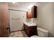 Bathroom has a vanity, framed mirror, and toilet at 191 White Oak Church Rd, Dallas, GA 30157