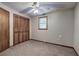 Bedroom features carpet, window, and closet at 191 White Oak Church Rd, Dallas, GA 30157