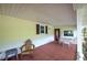 Large covered porch with seating, ideal for entertaining or relaxing outdoors at 191 White Oak Church Rd, Dallas, GA 30157