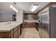 Spacious kitchen with stainless steel appliances, wood cabinets, and light countertops at 191 White Oak Church Rd, Dallas, GA 30157