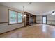 Bright living room features hardwood floors, fireplace with built-ins, and large windows at 191 White Oak Church Rd, Dallas, GA 30157