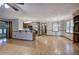 Living room with an open layout to the kitchen and adjacent sunroom at 191 White Oak Church Rd, Dallas, GA 30157