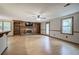 Spacious living room with fireplace, built-ins, and view to kitchen bar at 191 White Oak Church Rd, Dallas, GA 30157