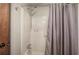 Shower with curtain rod and fixtures at 191 White Oak Church Rd, Dallas, GA 30157