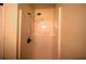 Enclosed shower with white walls and chrome fixtures at 191 White Oak Church Rd, Dallas, GA 30157