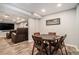 Finished basement features a game table and cozy seating for entertainment at 2258 Bright Water Dr, Snellville, GA 30078