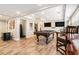 Basement game room featuring a pool table, kitchenette, and two wall mounted televisions at 2258 Bright Water Dr, Snellville, GA 30078