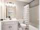 Well-maintained bathroom with a shower-tub combo and contemporary fixtures at 2258 Bright Water Dr, Snellville, GA 30078