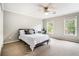Cozy bedroom with two large windows that boast plenty of natural light at 2258 Bright Water Dr, Snellville, GA 30078
