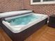 Relaxing hot tub with jets on a wooden deck at 2258 Bright Water Dr, Snellville, GA 30078
