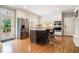 Modern kitchen with stainless steel appliances and hardwood floors at 2258 Bright Water Dr, Snellville, GA 30078