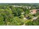 Aerial view of a home on a lot near an intersection, with outlined property lines at 2667 Peyton Nw Rd, Atlanta, GA 30318
