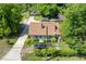 Aerial view of a cozy home showcasing its well-maintained lawn and beautiful landscaping at 2667 Peyton Nw Rd, Atlanta, GA 30318