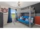 A themed bedroom featuring a bunk bed with a futon and natural light from the window at 82 Hydrangea Cir, Fairburn, GA 30213
