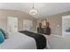 Serene primary bedroom with calming color palette, modern lighting, and ample space for relaxation and rest at 82 Hydrangea Cir, Fairburn, GA 30213