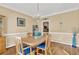Formal dining room with wood floors and a chandelier at 902 Laurel Crest Dr, Woodstock, GA 30189