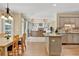Open-concept kitchen featuring granite countertops, stainless steel appliances, and eat in dining area at 902 Laurel Crest Dr, Woodstock, GA 30189