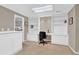 Home office showcasing custom built-in shelving and a work area at 902 Laurel Crest Dr, Woodstock, GA 30189