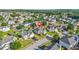 Community aerial view highlighting the home's location in a neighborhood with mature trees at 160 Oak Manor Dr, Covington, GA 30016