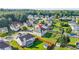 Aerial view of home in a neighborhood featuring a spacious backyard with privacy fence at 160 Oak Manor Dr, Covington, GA 30016
