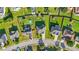 Aerial view of the property, showcasing the backyard, landscaping, and nearby homes at 160 Oak Manor Dr, Covington, GA 30016