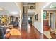 Inviting foyer with hardwood floors, staircase, and views into other living spaces at 160 Oak Manor Dr, Covington, GA 30016