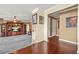 View of the living room showing carpeted floor and opening to hallway with hard wood flooring at 160 Oak Manor Dr, Covington, GA 30016