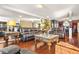Spacious living room with leather couches and mirrored wall, perfect for relaxation and entertainment at 160 Oak Manor Dr, Covington, GA 30016