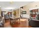 Spacious living room with hardwood floors, bar, and ornate furniture at 160 Oak Manor Dr, Covington, GA 30016