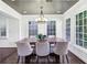 Chic dining room featuring a wooden table, comfortable chairs, and natural light at 382 Lofton Nw Rd, Atlanta, GA 30309