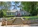 Charming house with landscaped front yard and stone steps at 382 Lofton Nw Rd, Atlanta, GA 30309