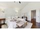Spacious main bedroom with hardwood floors, large bed, and ample natural light at 382 Lofton Nw Rd, Atlanta, GA 30309