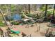 A wonderful community playground with a slide, swings, and climbing structures at 382 Lofton Nw Rd, Atlanta, GA 30309