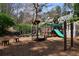 A community playground area with slides, climbing bars, and play equipment at 382 Lofton Nw Rd, Atlanta, GA 30309