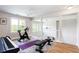 Upstairs bonus room is spacious with lots of light for home exercise and piano playing at 6505 Hampton Creek Dr, Cumming, GA 30041