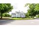 Charming clubhouse surrounded by lush greenery and manicured landscaping, set in a community at 6505 Hampton Creek Dr, Cumming, GA 30041