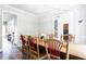 Inviting dining room with rustic wooden table and comfortable seating for memorable gatherings at 6505 Hampton Creek Dr, Cumming, GA 30041