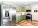 Well-equipped kitchen with stainless steel appliances, gas range, modern cabinets, and ample counter space at 6505 Hampton Creek Dr, Cumming, GA 30041