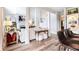 Open-concept living space with hardwood floors, stylish furniture, and plenty of natural light at 6505 Hampton Creek Dr, Cumming, GA 30041