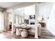 Inviting living room showcasing hardwood floors, natural light, a fireplace, and stylish furnishings at 6505 Hampton Creek Dr, Cumming, GA 30041