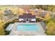 Community pool and clubhouse with an outdoor pool offering a refreshing retreat at 6505 Hampton Creek Dr, Cumming, GA 30041