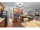 The kitchen features wooden cabinets, stainless steel appliances, and an island at 117 Constance Dr, Locust Grove, GA 30248