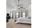 Bright main bedroom with tray ceiling and plenty of space at 117 Constance Dr, Locust Grove, GA 30248